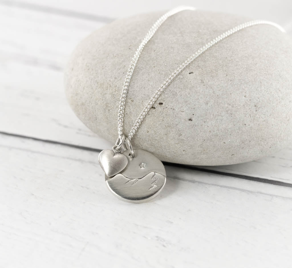 Handmade silver Catbells necklace with a little silver heart